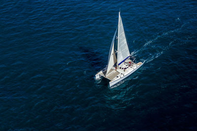 High angle view of sailboat sailing on sea