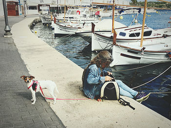 Dog sitting in a boat