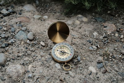 High angle view of clock on field