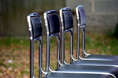 Close-up of empty seats in row