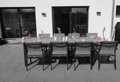 Empty chairs and tables in cafe