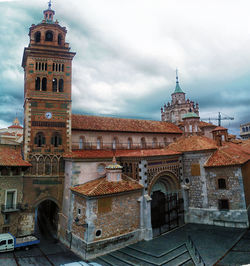 View of clock tower against cloudy sky