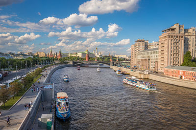 View of bridge over river against cloudy sky