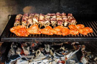 Close-up of meat on barbecue grill