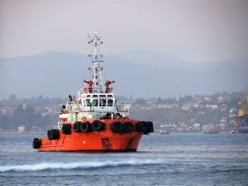 Ship in sea against sky