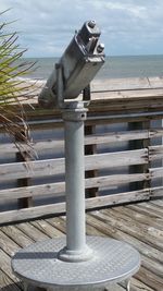 Close-up of wood against sea