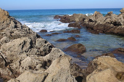 Scenic view of sea against clear sky