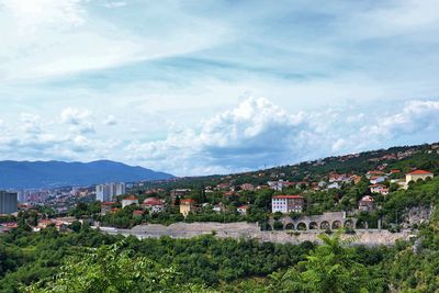 High angle shot of townscape against sky