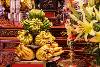 Sculpture of fruits at market stall