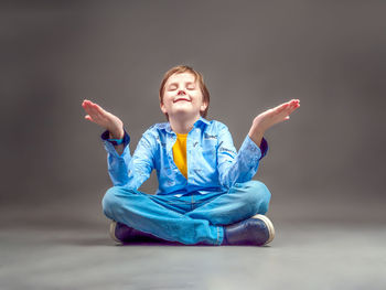 Portrait of boy playing with toy