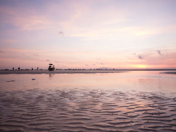 Scenic view of sea at sunset