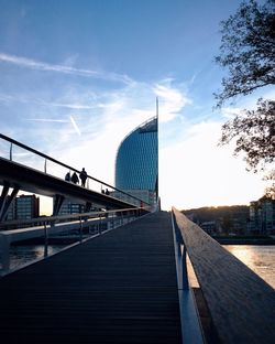 Bridge against sky in city