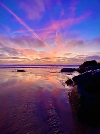 Scenic view of sea against sky during sunset