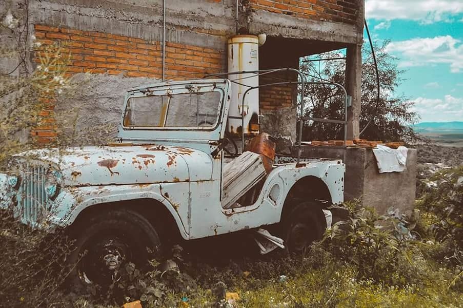 architecture, built structure, abandoned, building exterior, old, obsolete, damaged, run-down, house, weathered, deterioration, day, bad condition, sky, wood - material, window, arch, outdoors, sunlight, no people