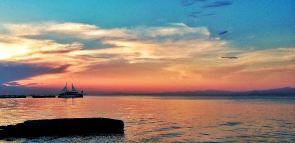 Scenic view of sea at sunset