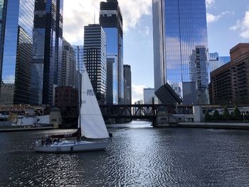 Modern buildings in city against sky