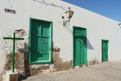 View of buildings against blue sky