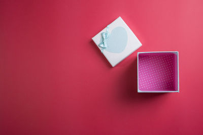 Close-up of heart shape on pink paper