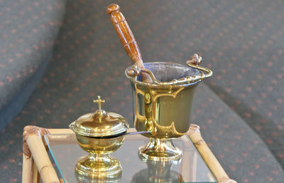 Close-up of wine glasses on table