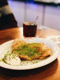 Close-up of food served on table