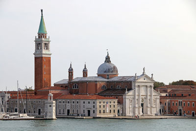 View of the church of s.giorgio from a window of palazzo ducale.	