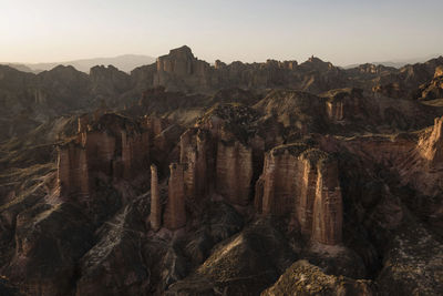 Aerial view of rocky landscape against sky