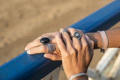 Close-up of human hand against blurred background