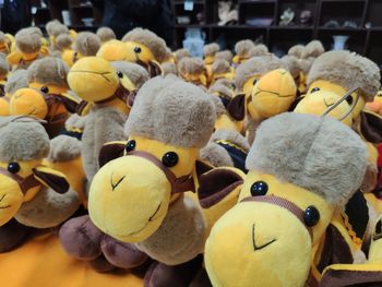 Close-up of yellow stuffed toys