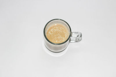 High angle view of coffee cup on table