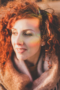 Close-up of redhead woman in warm clothing