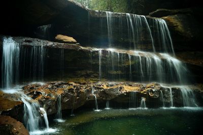 Scenic view of waterfall in forest