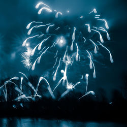 Firework display at night