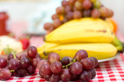 Close-up of grapes on table