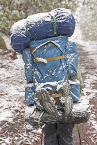 Backpacker in a spring snowstorm in the smoky mountains