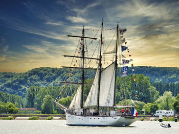 Sailboats sailing on sea against sky. armada rouen france