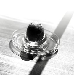 High angle view of drinking glass on table