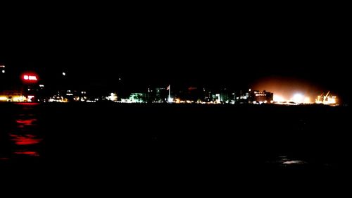 View of illuminated city at night