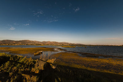 View of calm blue sea against the sky