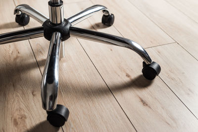 High angle view of bicycle on wooden table