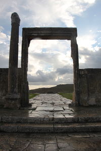 Old ruin building against cloudy sky