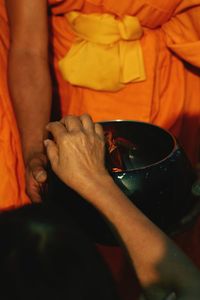 Midsection of monks during traditional festival