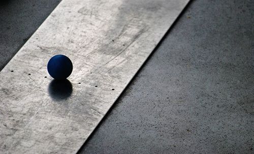 High angle view of ball on metal