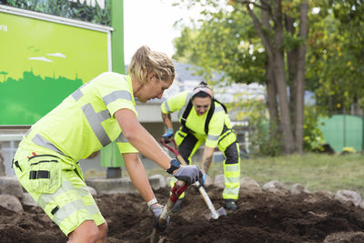 Female workers doing landscaping work