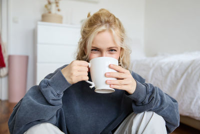 Young woman using mobile phone