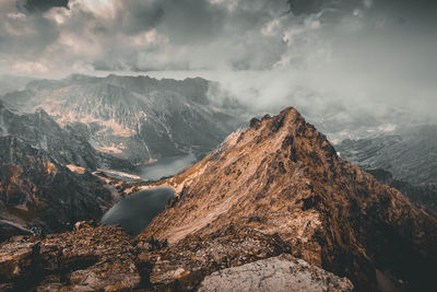 Panoramic view of rocky mountains against sky