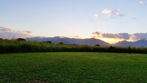 Scenic view of landscape against sky during sunset