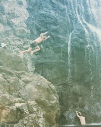 Woman swimming in sea