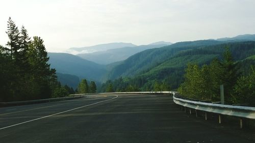 Country road passing through landscape