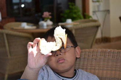 Close-up of woman eating ice cream