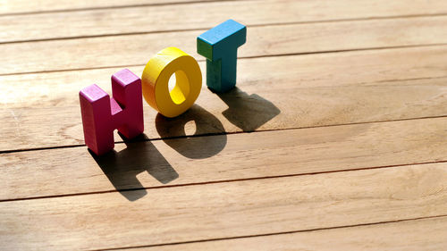 High angle view of toy on wooden table